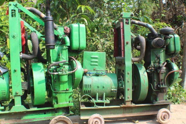 Large green colour electrical power generator. Electrical generator. Diesel generator.